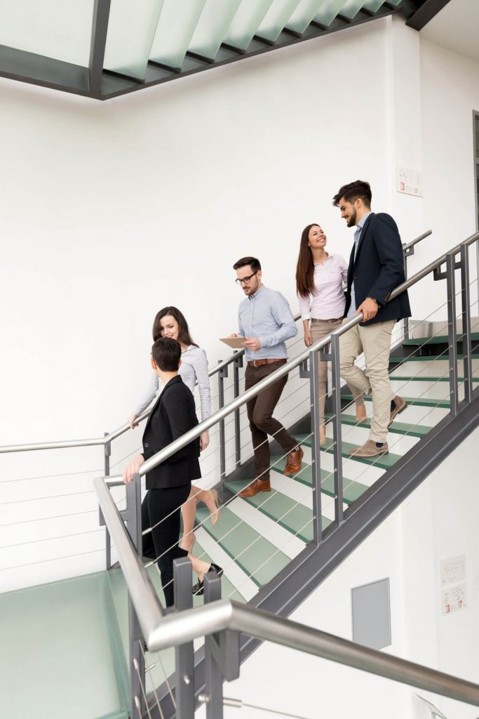 a group of people on a staircase