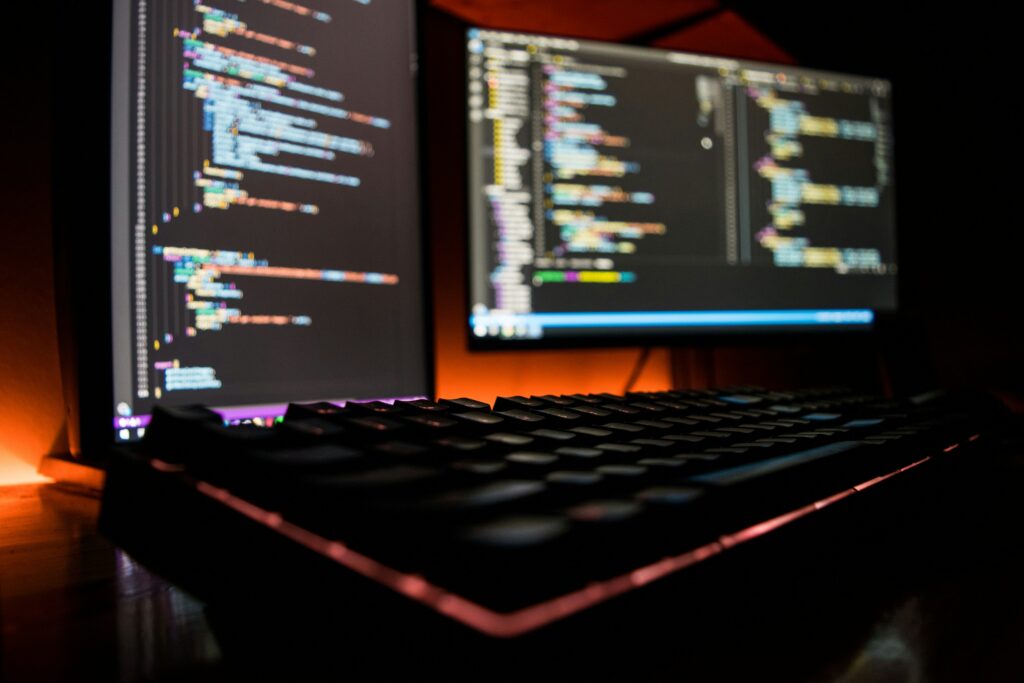 a computer screen with a keyboard